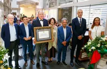 Acto de concesi&oacute;n del t&iacute;tulo de Hijo Adoptivo.