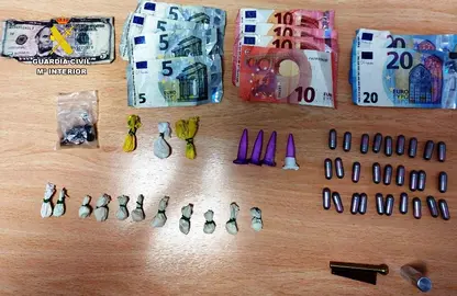 Dinero y drogas incautados.