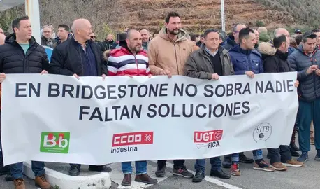 Pancarta en la movilización con los trabajadores.