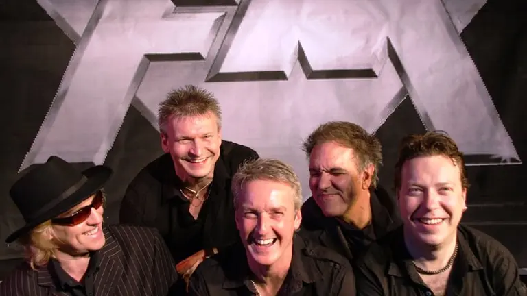 Integrantes del grupo FM.